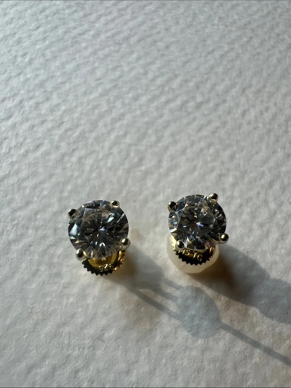 Sterling Silver Clear Stone Stud Earrings in Gold-Tone Setting
